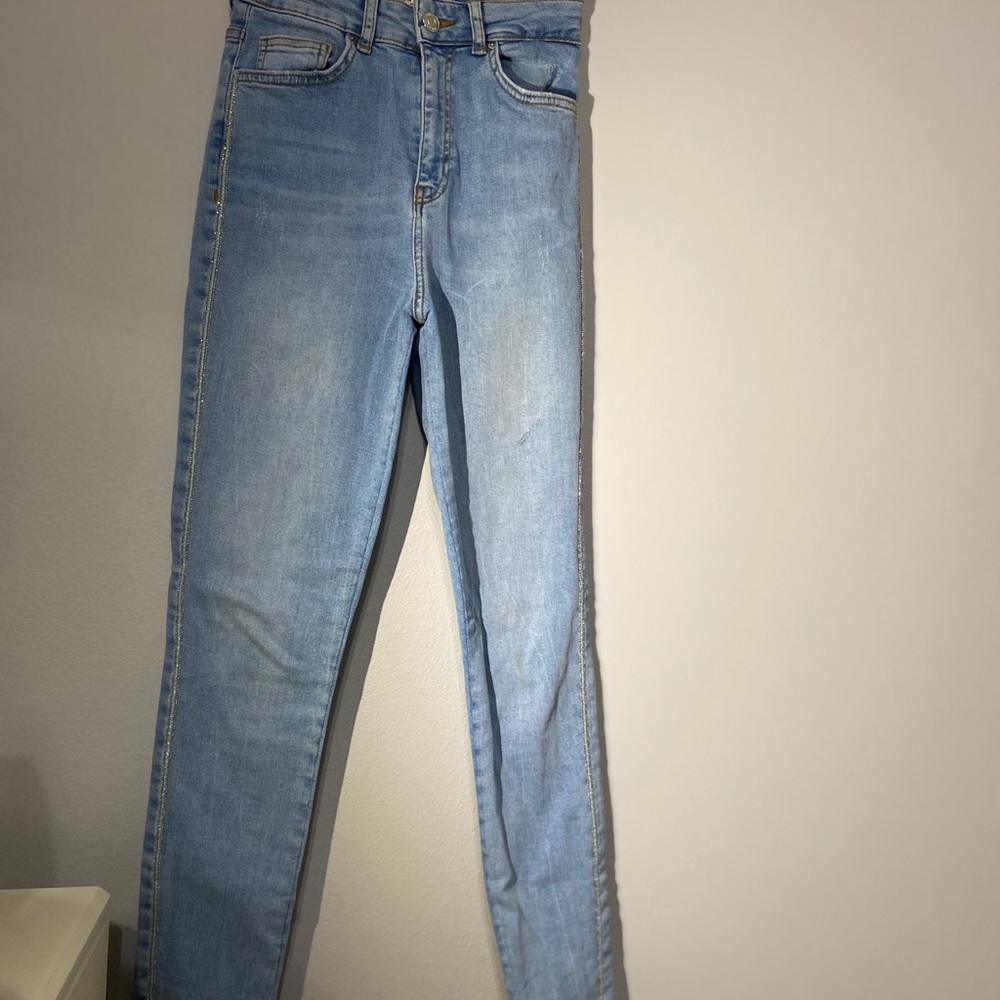 High rise blue jeans